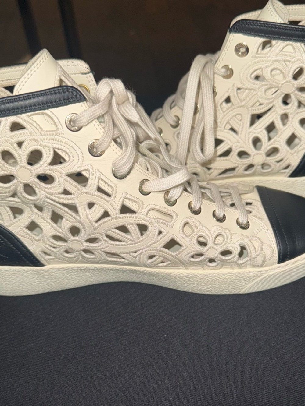 CHANEL Cream Cutout High-Top Sneakers with Black Toe Caps - Picture 2 of 4